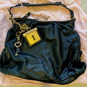 Black leather Juicy Couture shoulder bag with dust bag.